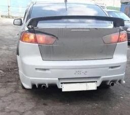 Задний бампер Mitsubishi Lancer 10